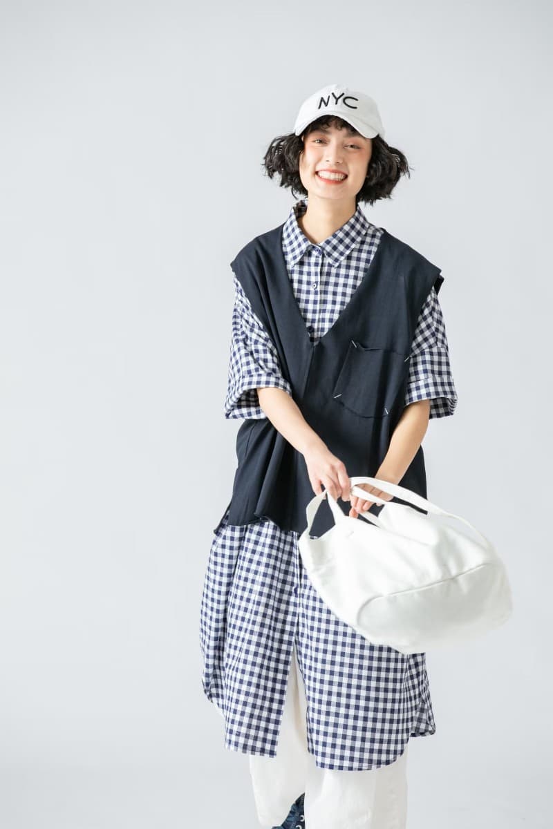 重ね着風ゆったりポケット付きベスト